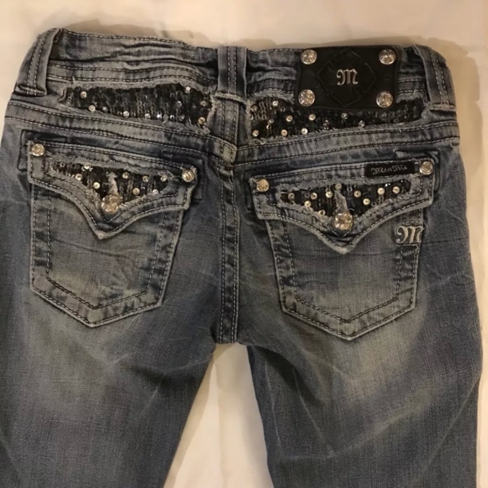 Miss Me Jeans.  Embellished Pockets.  Size: 27